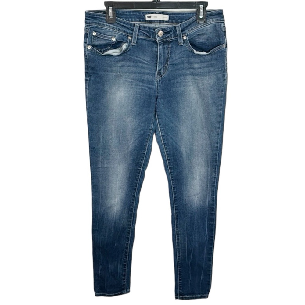 Levi’s mid rise medium wash vertical fade crease legging skinny jeans size 31